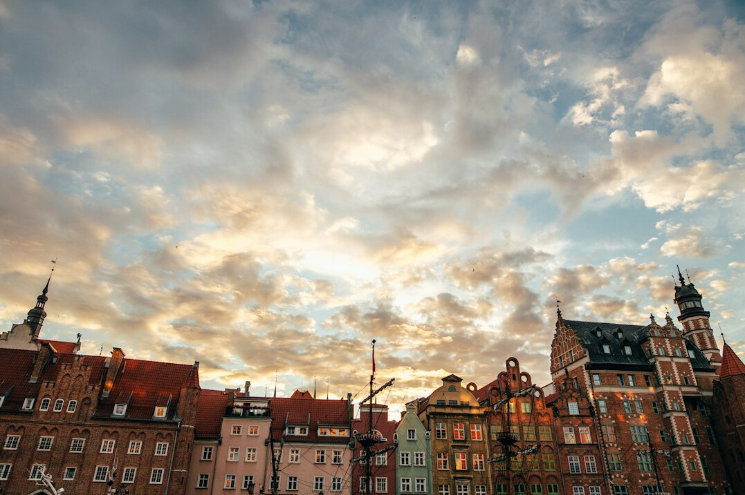 Gdansk Long Market with colorful tenement houses at sunset